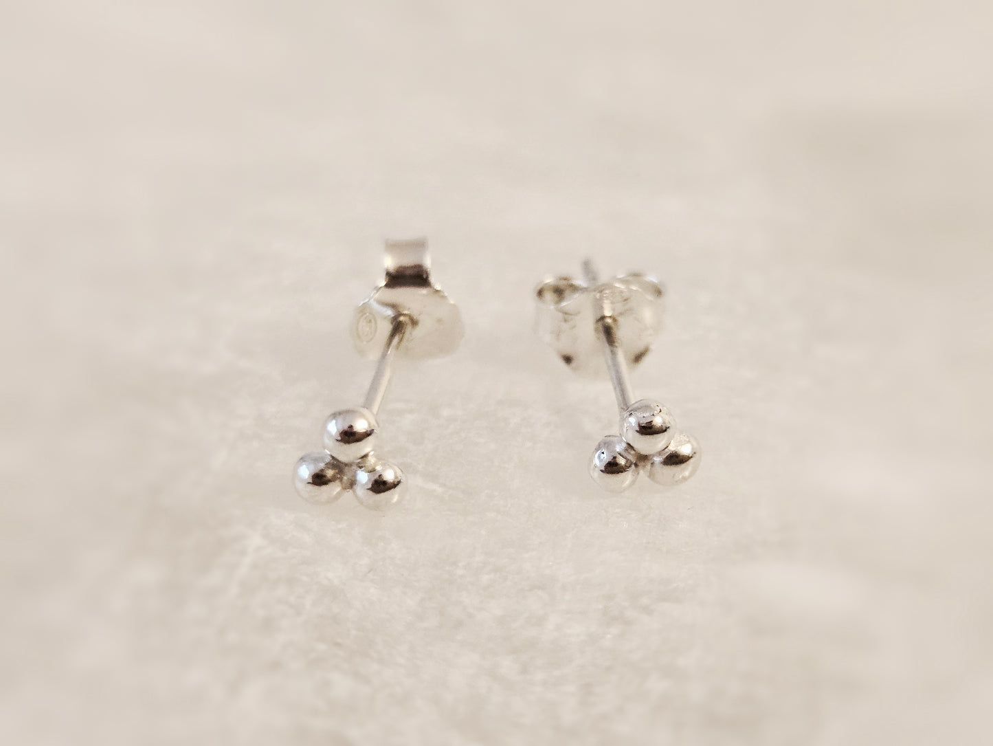 Three bead stud earrings